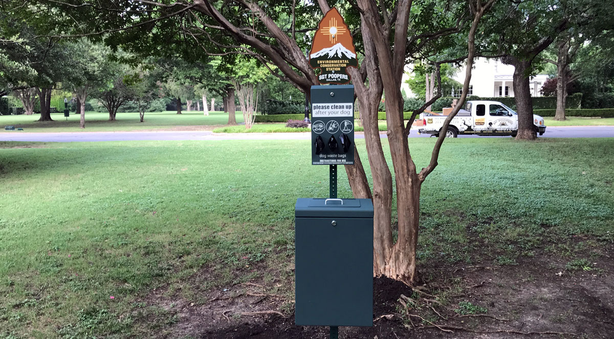 Custom dog waste station with 3 roll dispenser newly installed