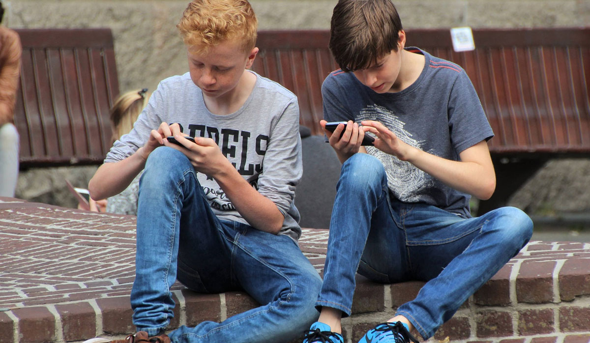 Kids using cell phones