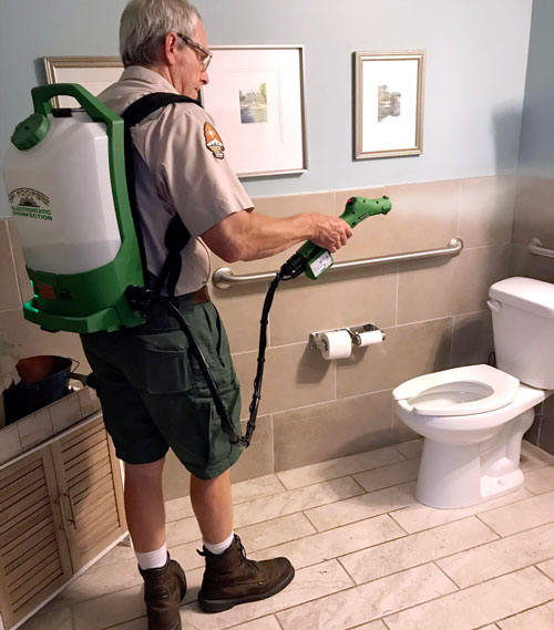 Electrostatic disinfection of a bathroom