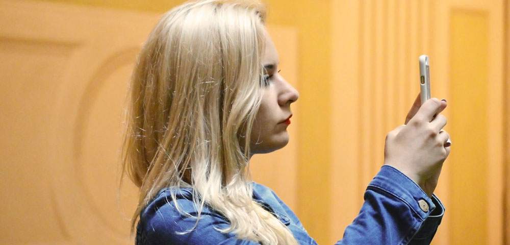 Image of woman with a cell phone