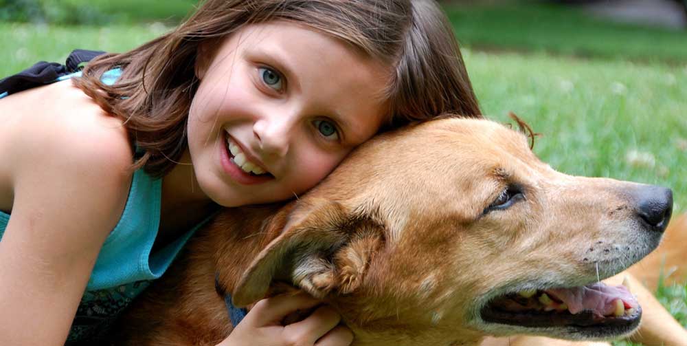 Sgt. Poopers can eliminate pet odors by killing the germs that cause odors. Image of dog and child