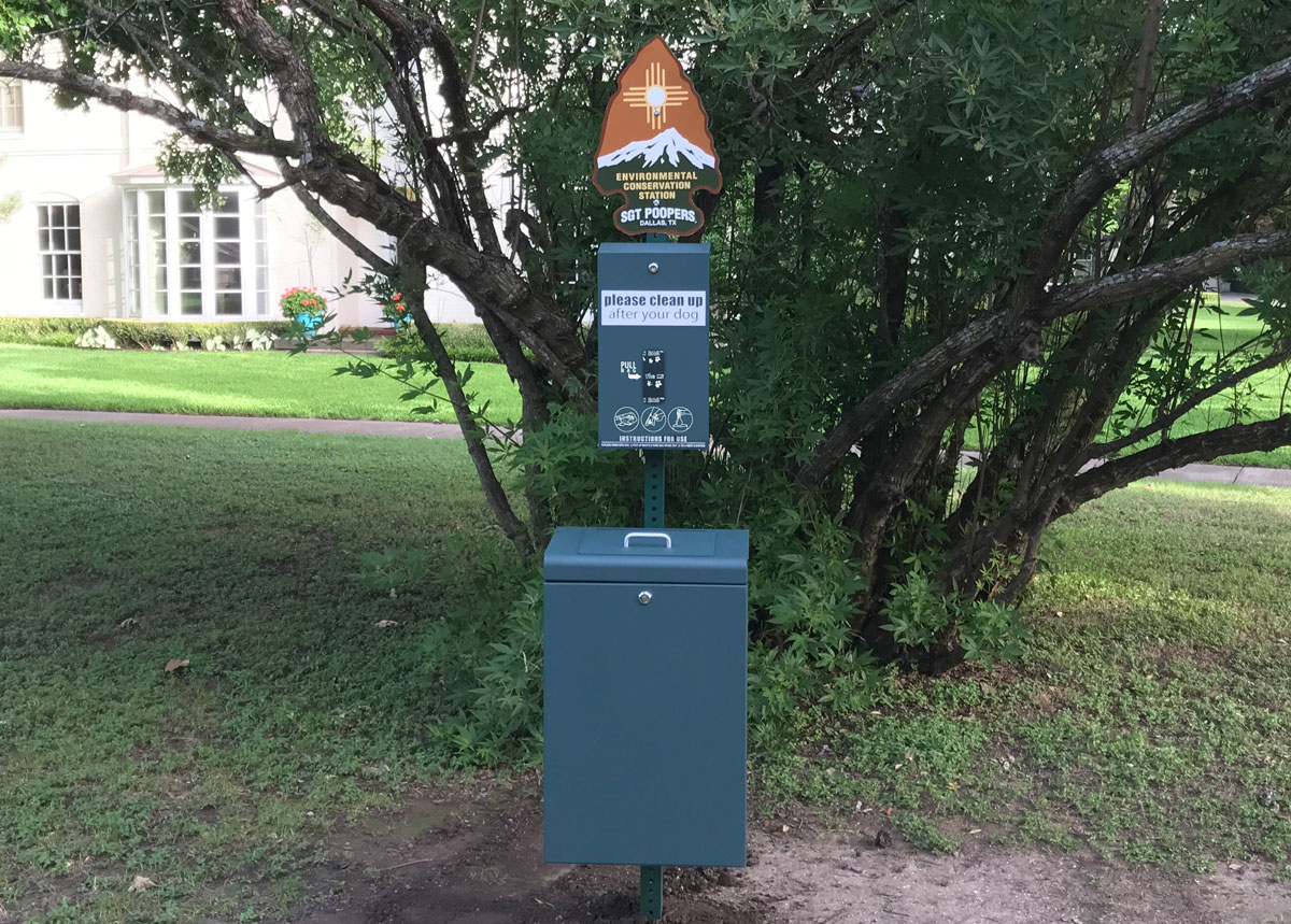 Dog Waste Station with mitten-bag dispenser.
