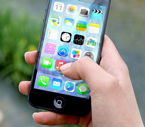 The modern smart phone: a rose with many thorns. Image of a smart phone